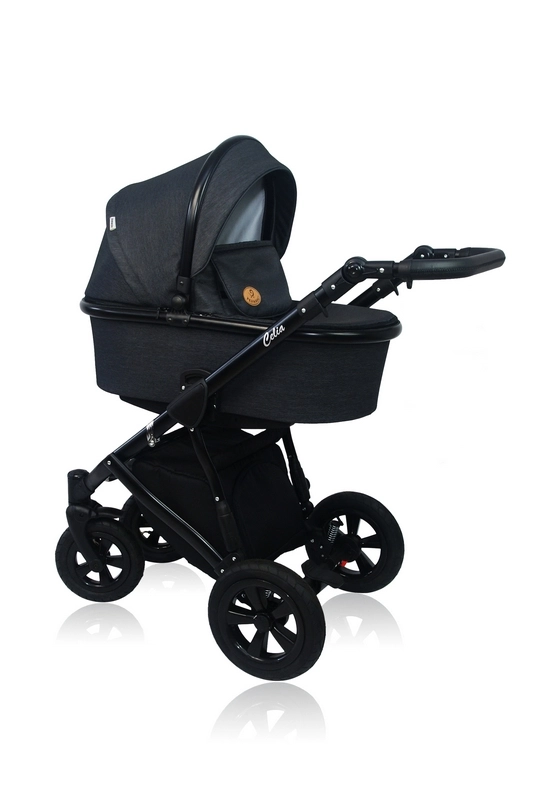 Celia - a baby pram with a black frame, a fastened basket and inflatable wheels